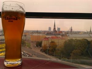 Indulging in a cheeky pint.